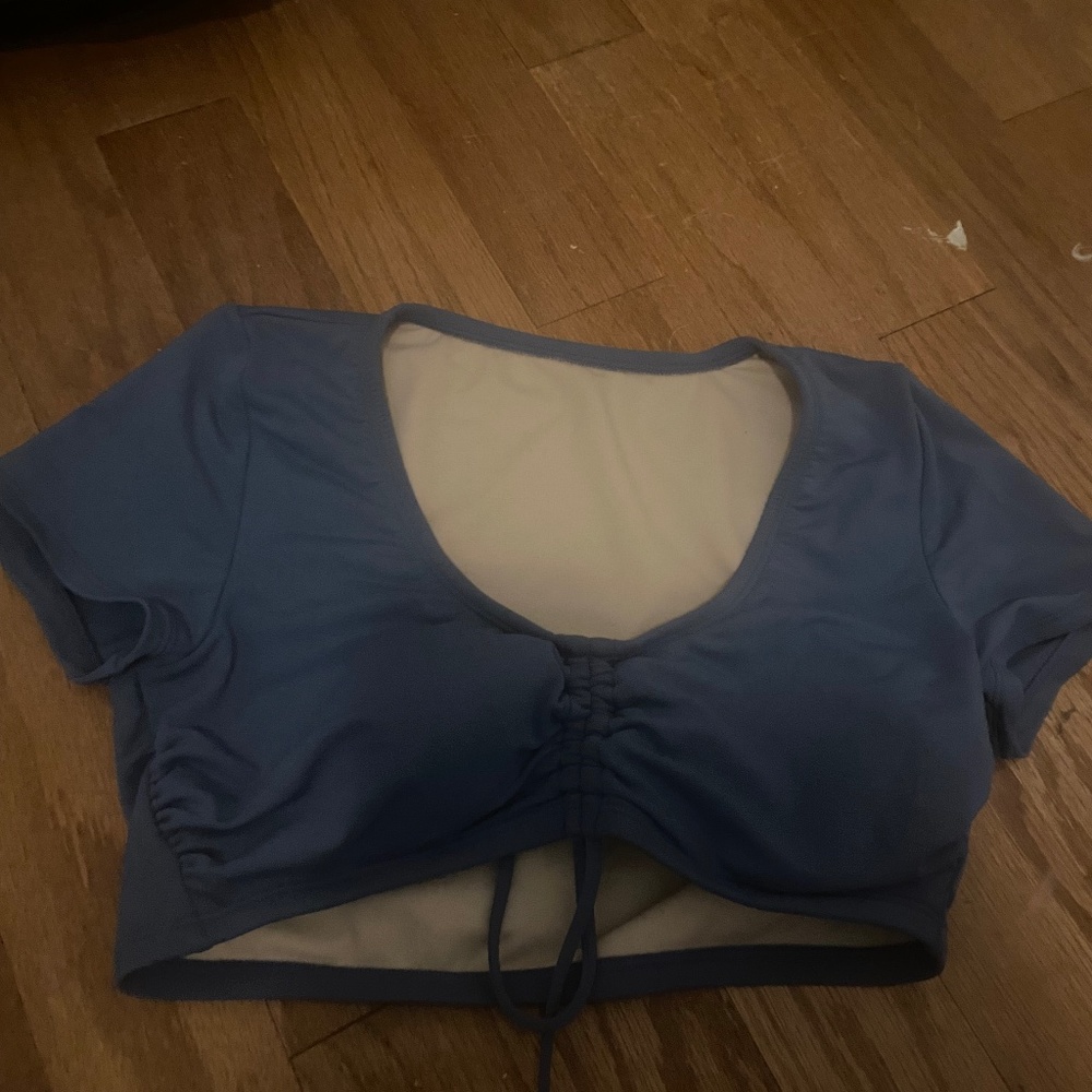 Blue bathing suit top size small Kona sol
